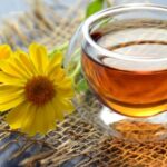 Herbal Tea - Clear Glass Bowl Beside Yellow Flower