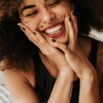 Mental Health Beauty - Woman Sitting And Smiling