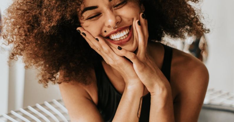Mental Health Beauty - Woman Sitting And Smiling