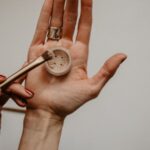 Natural Makeup - person holding silver round analog watch