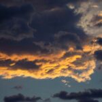 Highlighter Glow - gray and orange clouds during daytime