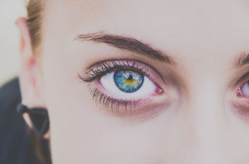 Colorful Mascara - close up photography of woman's right eye