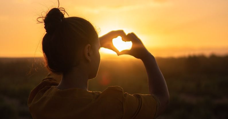 Hair Porosity - Woman Sitting While Showing Heart Sign Hands