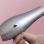 Hair Dryer - Person Holding Grey Hair Dryer