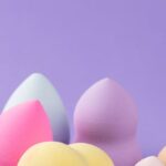 Beauty Blender - Makeup Products on Purple Surface